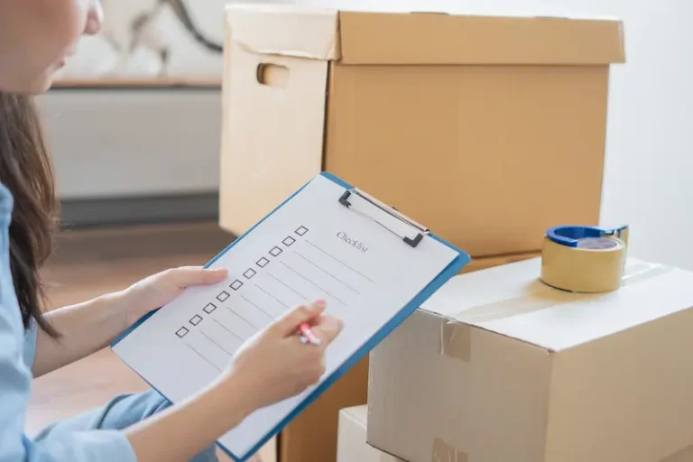 Homeowner with a moving checklist preparing for relocation